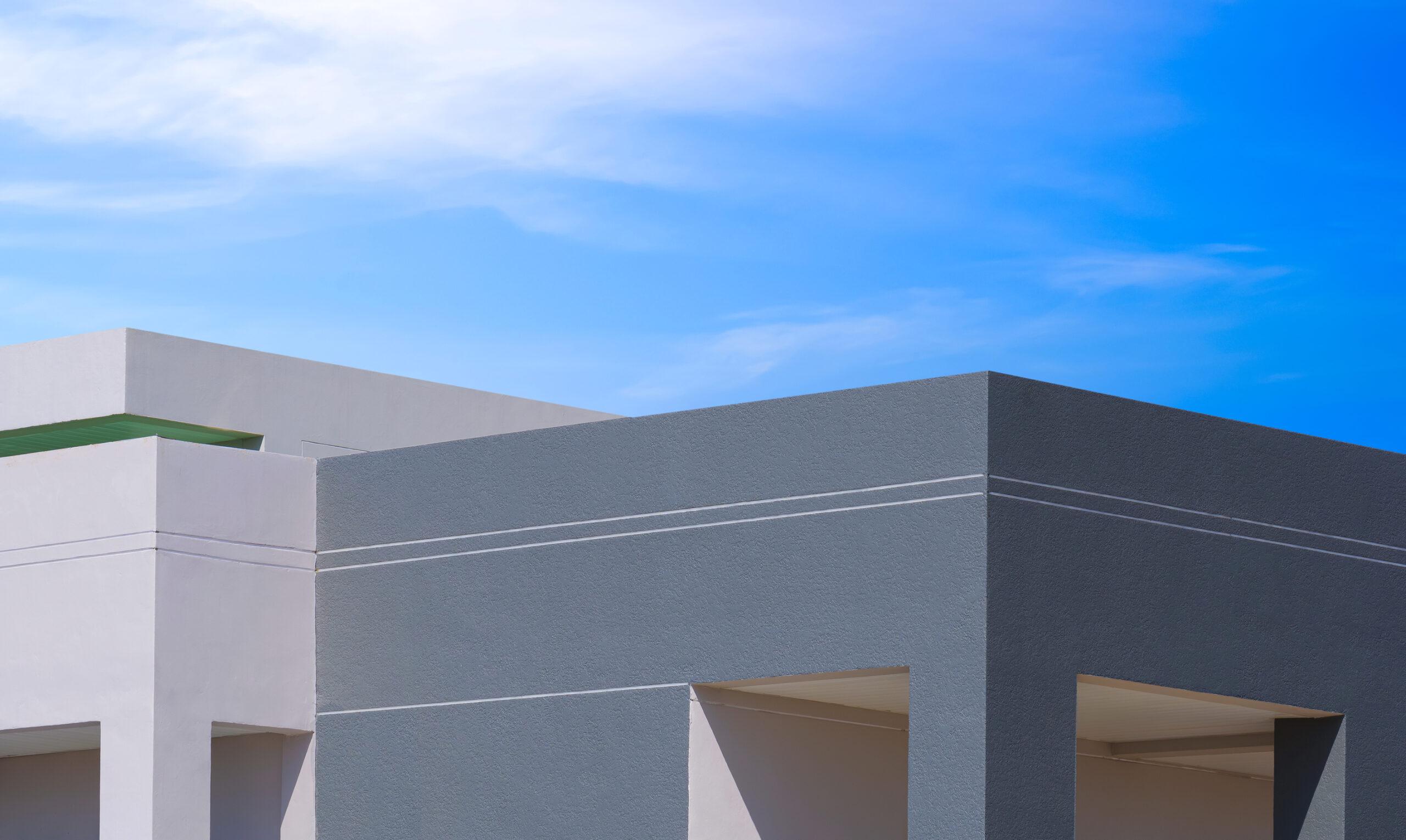geometric-gray-and-white-office-building-utc_50-scaled